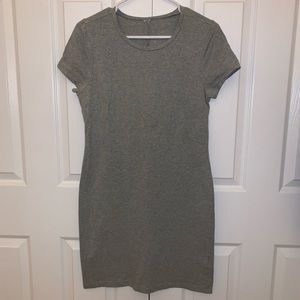 Grey body conscious mid length dress.